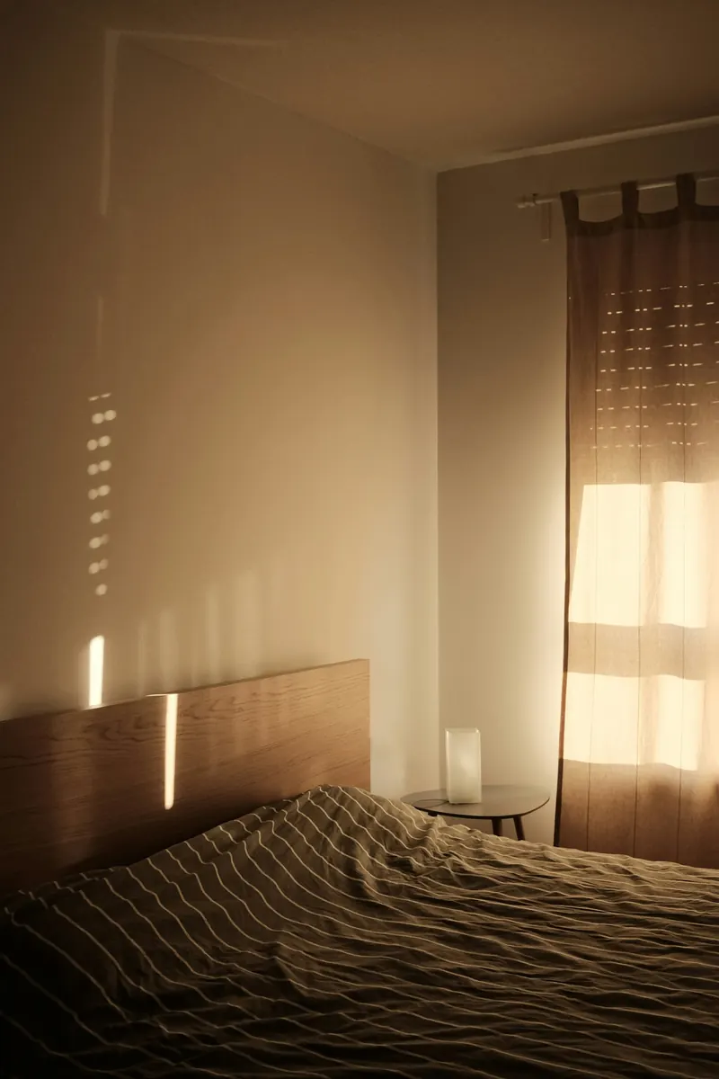 Quiet bedroom with morning light through the window