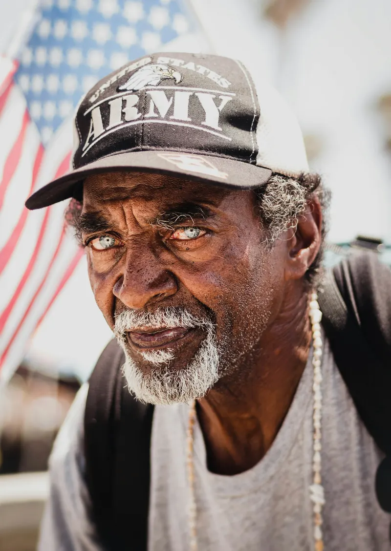 Older veteran wearing an Army cap
